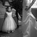 The flower girl waits for the bride.